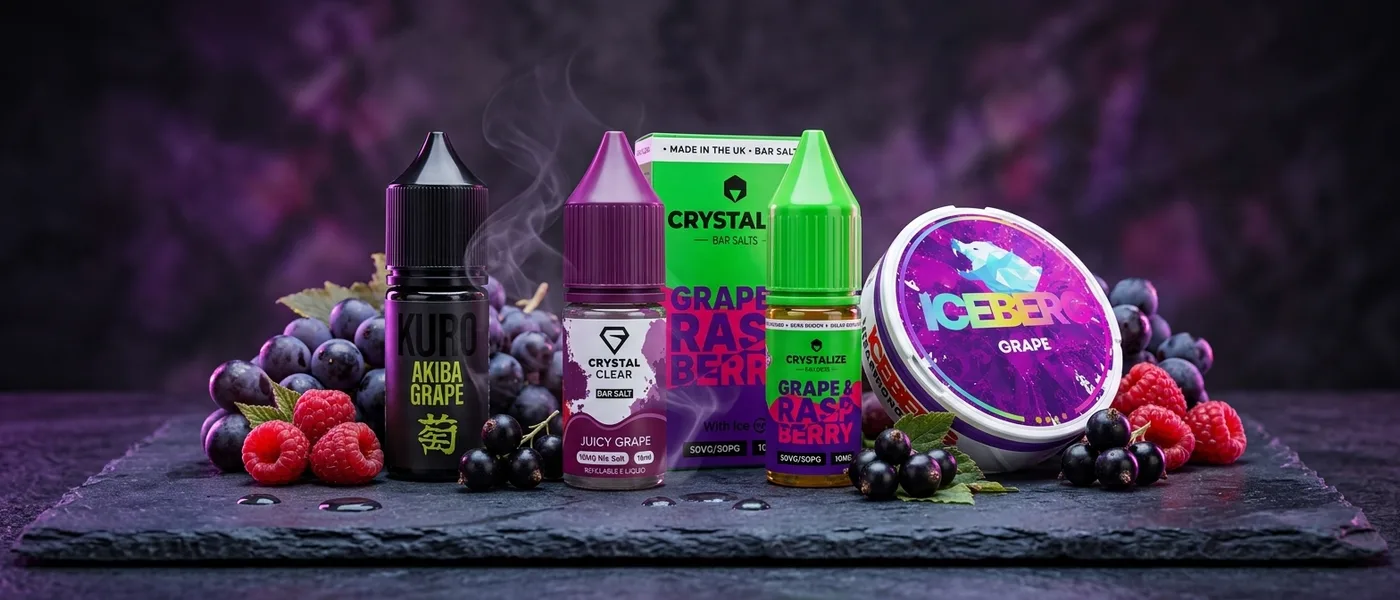 Grape Berry products surrounded by grapes, raspberries and blackcurrants